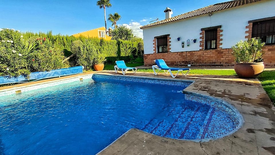 Property building, Pool view, Swimming pool, sunbed