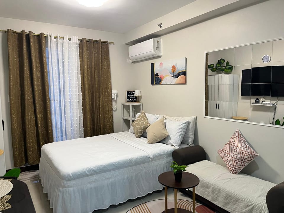 Bed, Living room, Seating area