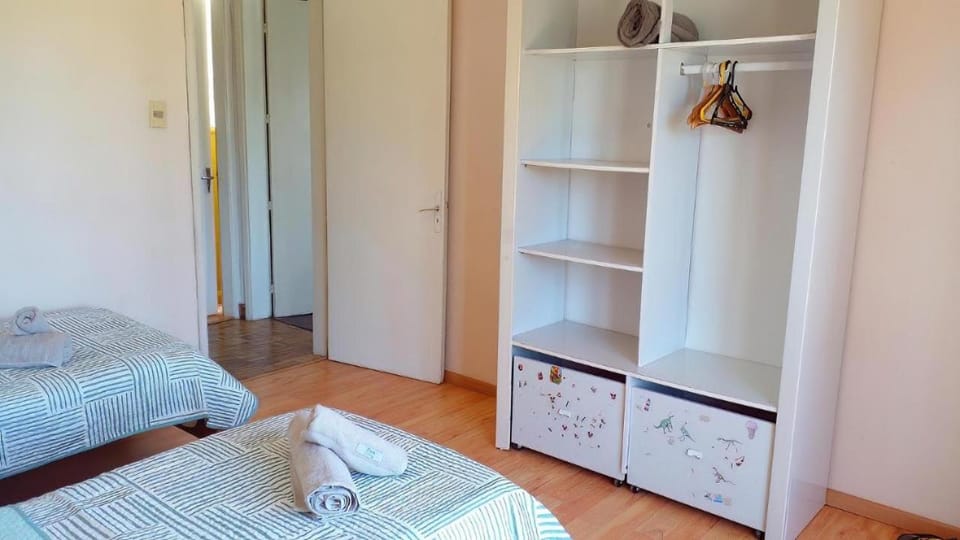 Bed, Photo of the whole room, Bedroom, children, young children, older children, towels, wardrobe