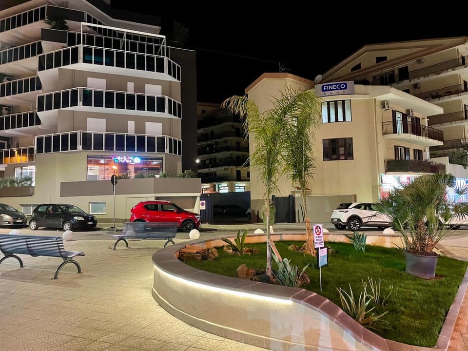 Property building, Night, Neighbourhood, City view, Street view, Location, Parking
