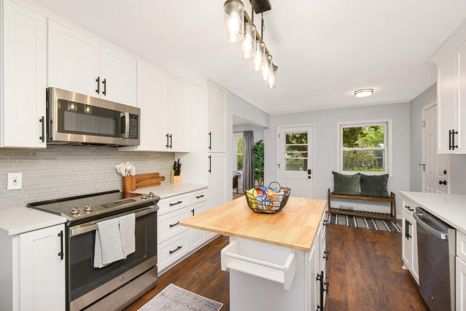 Kitchen or kitchenette, dishwasher, oven, stove, toaster