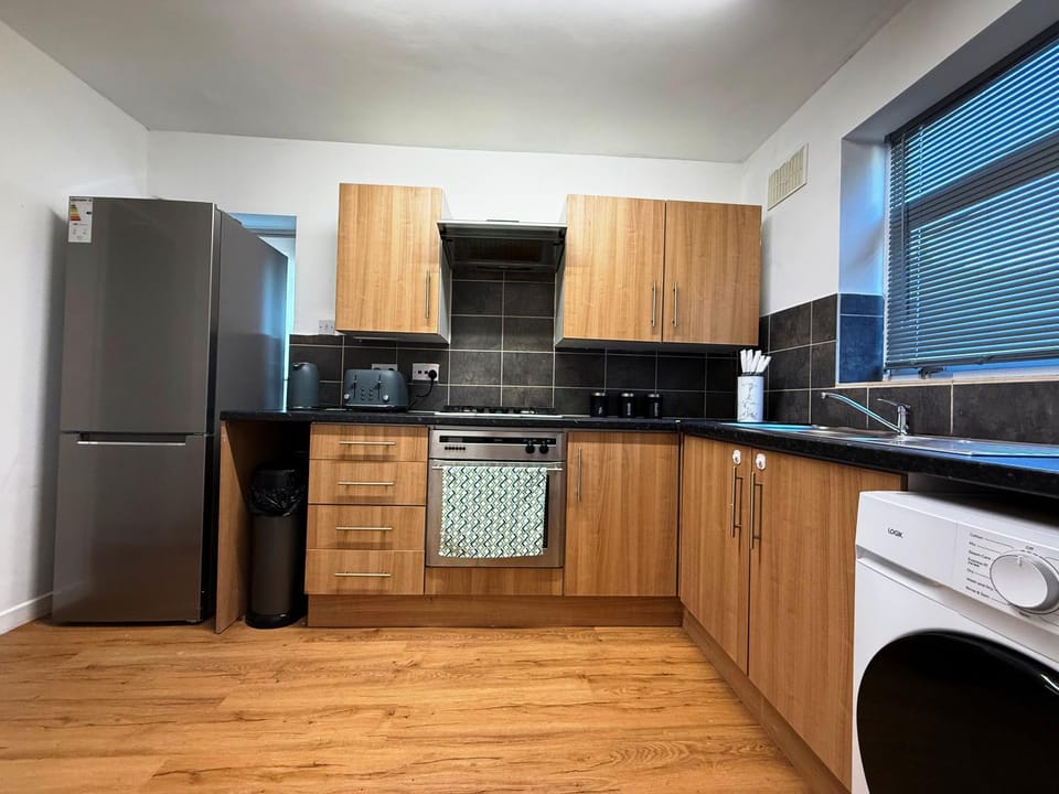 Kitchen or kitchenette, oven, stove