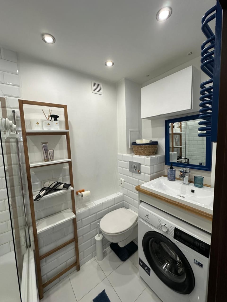 Shower, Toilet, Bathroom, towels, washing machine, dryer