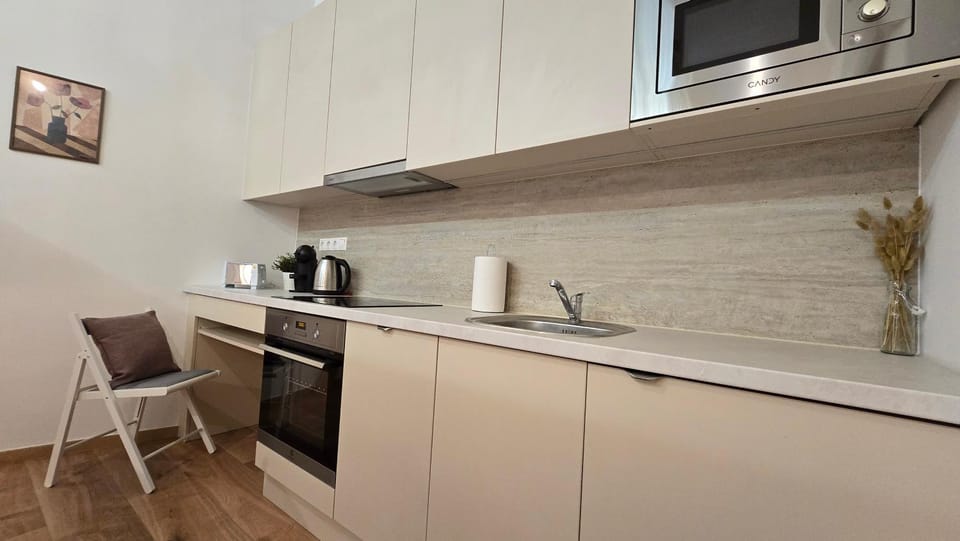 Kitchen or kitchenette, stove, toaster