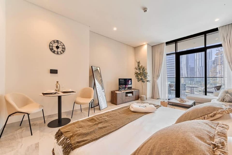 FAM Living Dubai Escape Sleek Studio at Peninsula Five Apartment in Dubai
