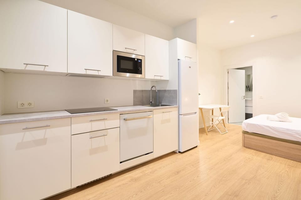 Kitchen or kitchenette, dishwasher, stove, washing machine