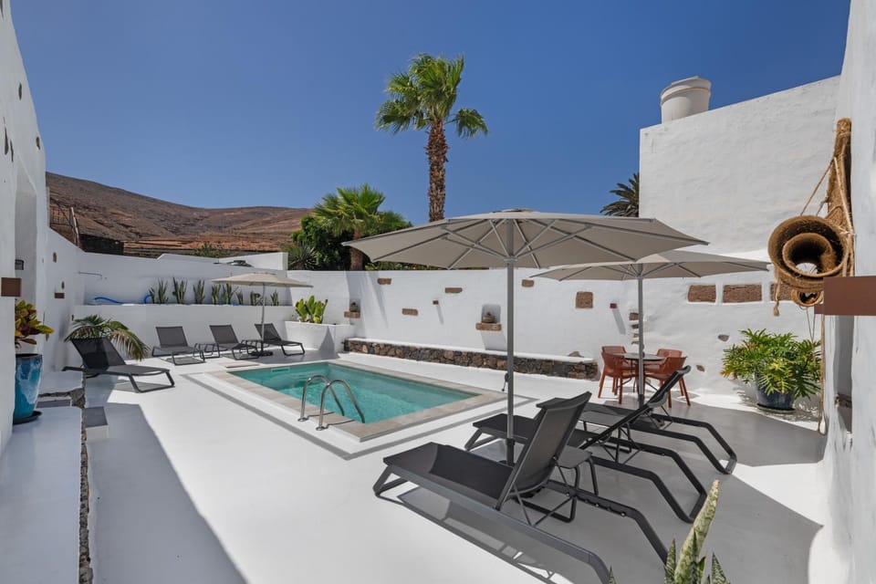 Property building, Living room, Swimming pool