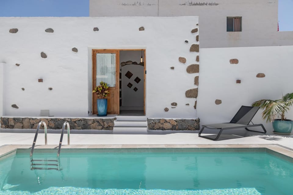 Property building, Living room, Swimming pool