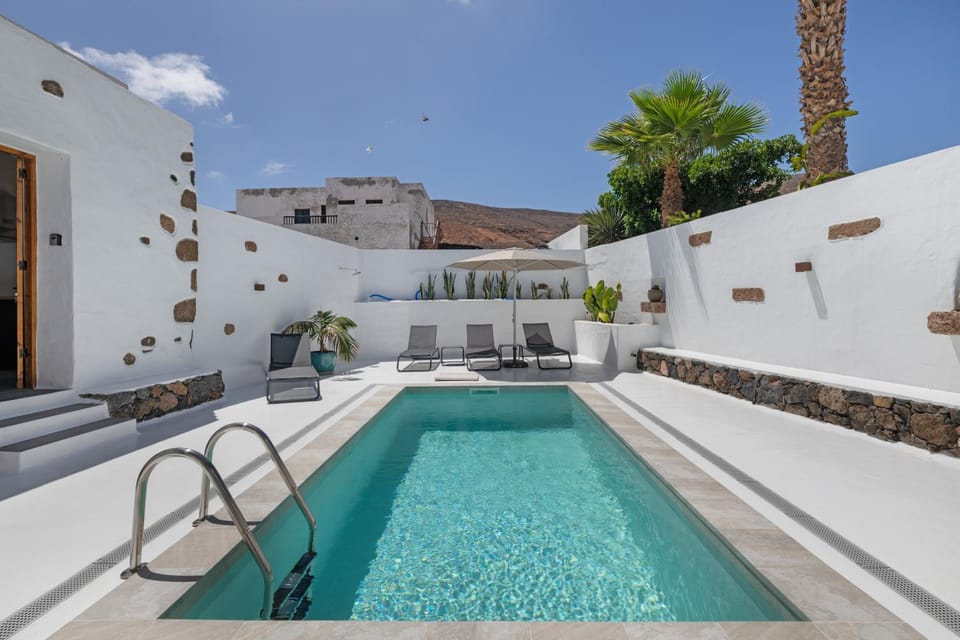 Property building, Living room, Swimming pool