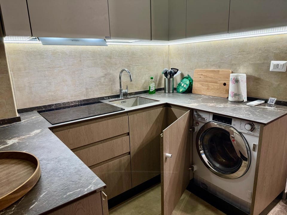 Kitchen or kitchenette, washing machine, dryer