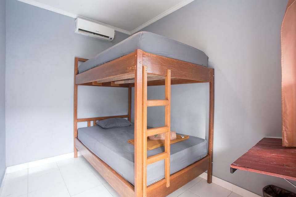 Photo of the whole room, bunk bed, air conditioner