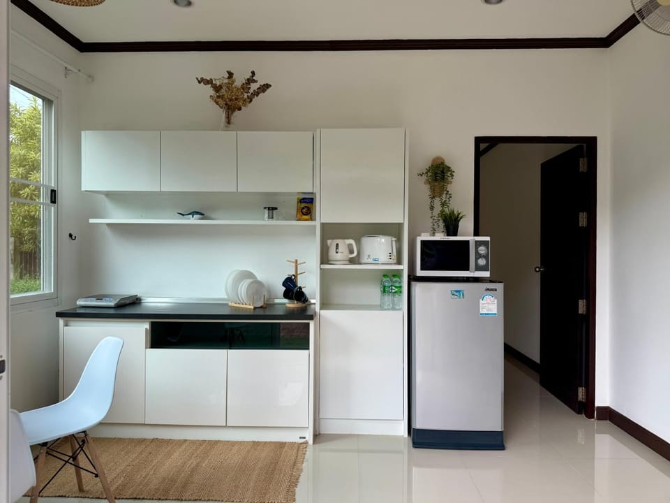 Kitchen or kitchenette, oven, stove