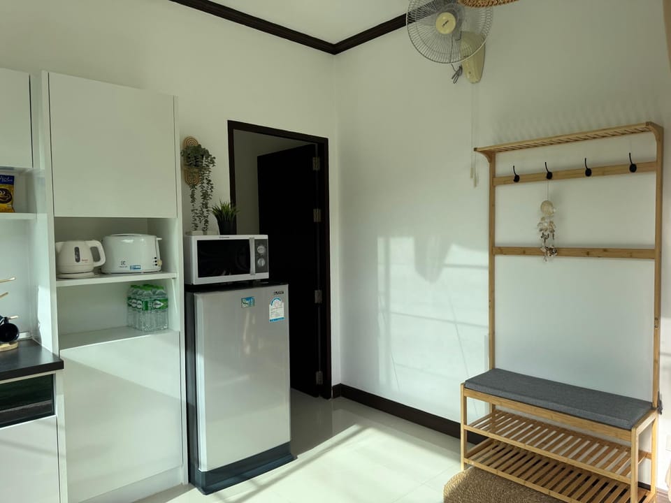 Kitchen or kitchenette, oven, stove, toaster
