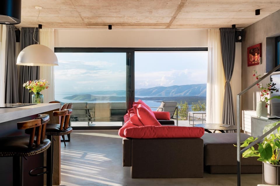 View (from property/room), Living room, Seating area, Mountain view, Sea view