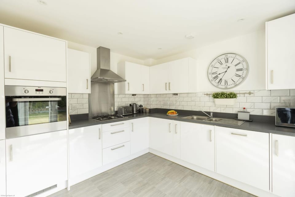 Kitchen or kitchenette, microwave, oven, stove, toaster