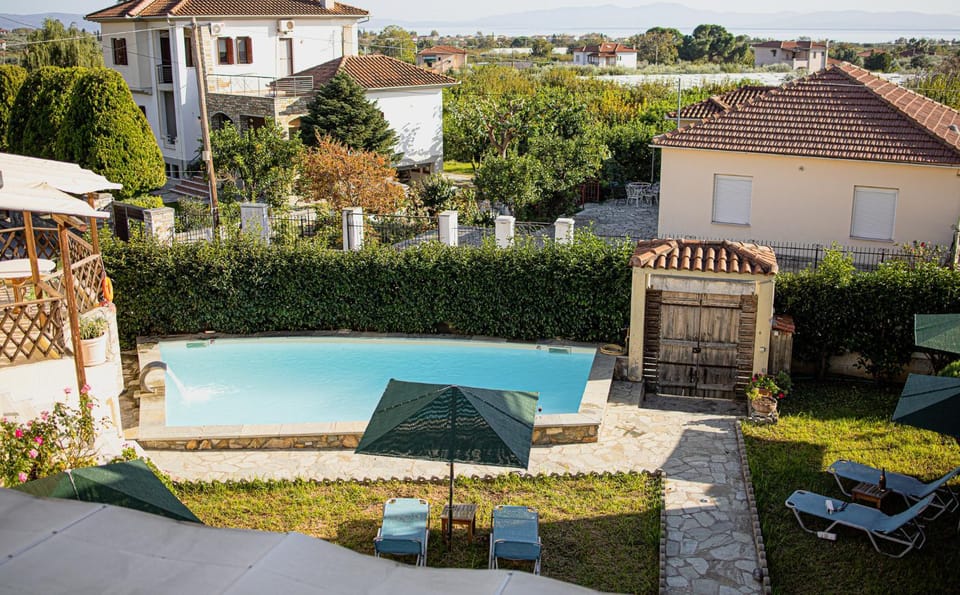 Patio, Day, Garden view, Pool view