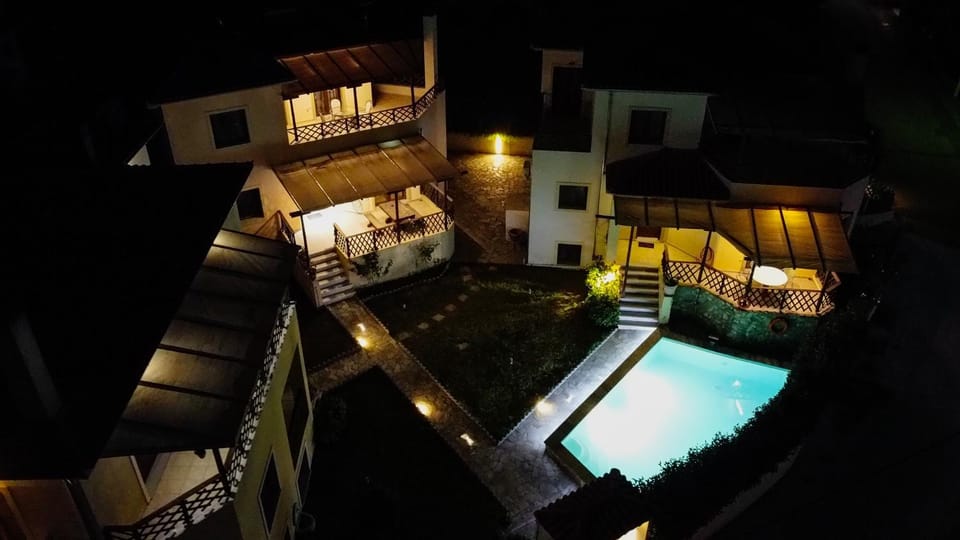 Property building, Patio, Night, Pool view