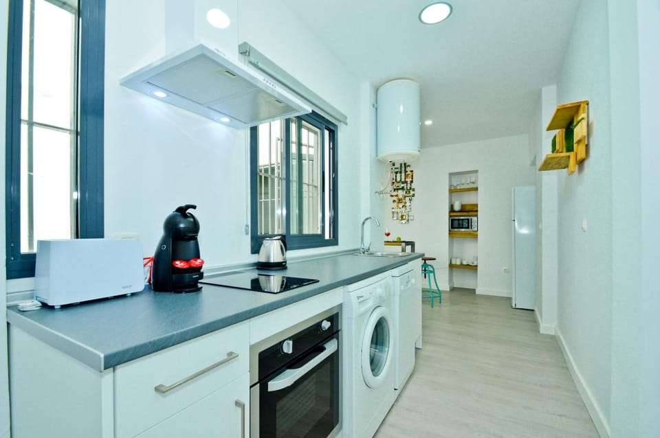 Kitchen or kitchenette, oven, stove, toaster