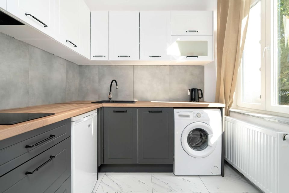 Kitchen or kitchenette, dishwasher, stove, washing machine
