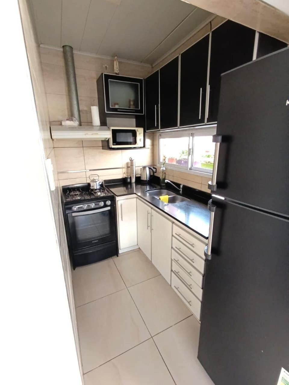 Kitchen or kitchenette, oven, stove