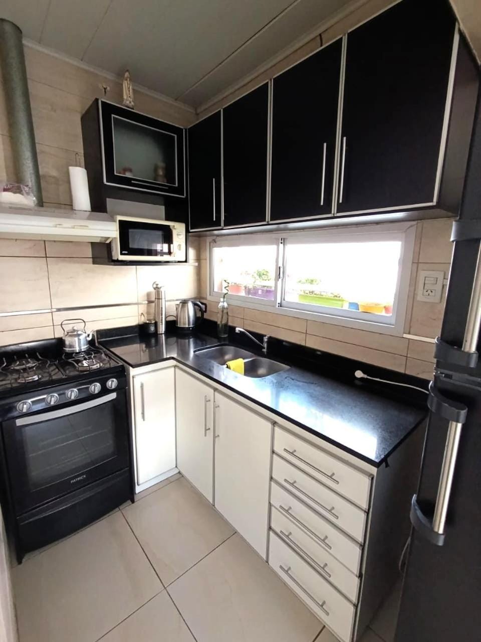 Kitchen or kitchenette, oven, stove