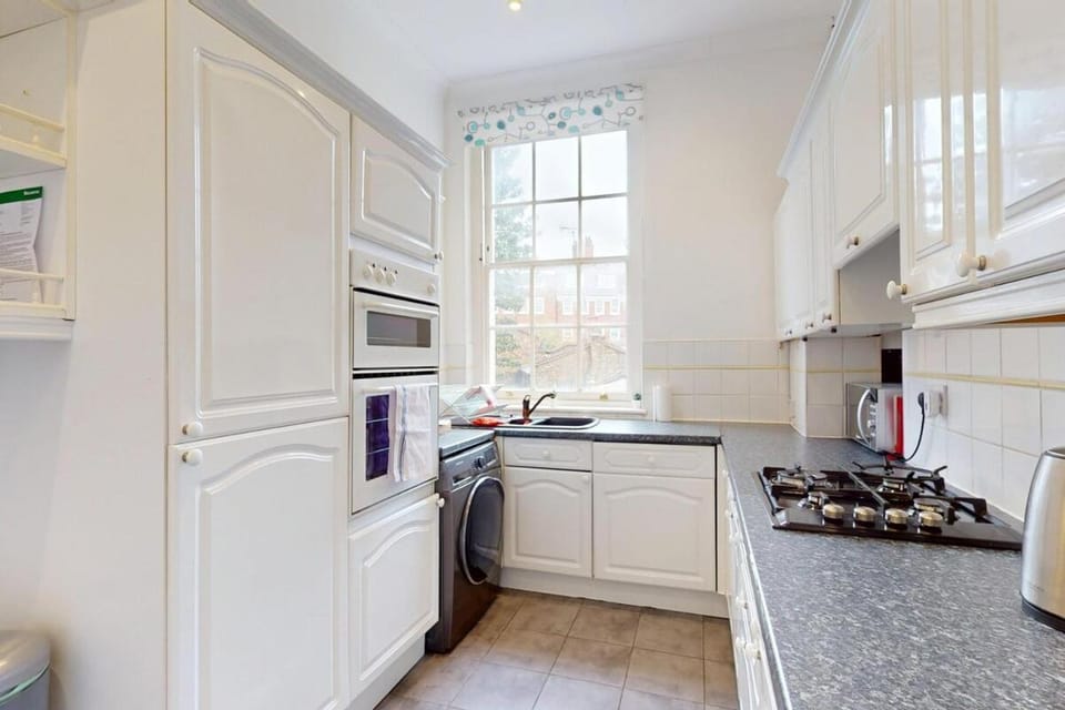 Kitchen or kitchenette, stove, toaster
