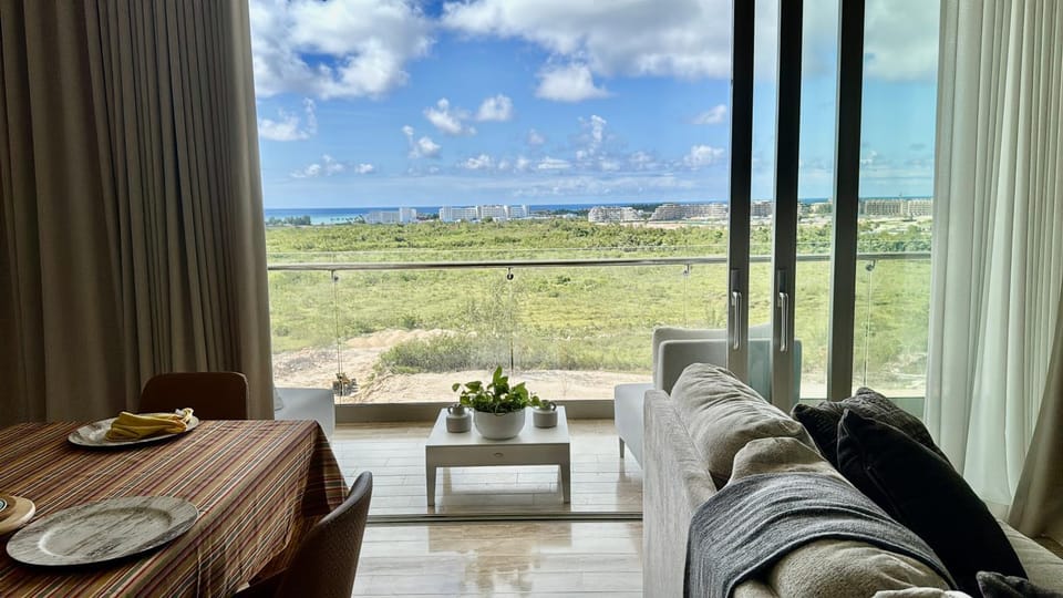 Natural landscape, View (from property/room), Living room, Dining area, Sea view