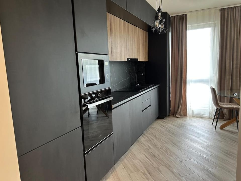 Dining area, dishwasher, microwave, oven, stove, washing machine