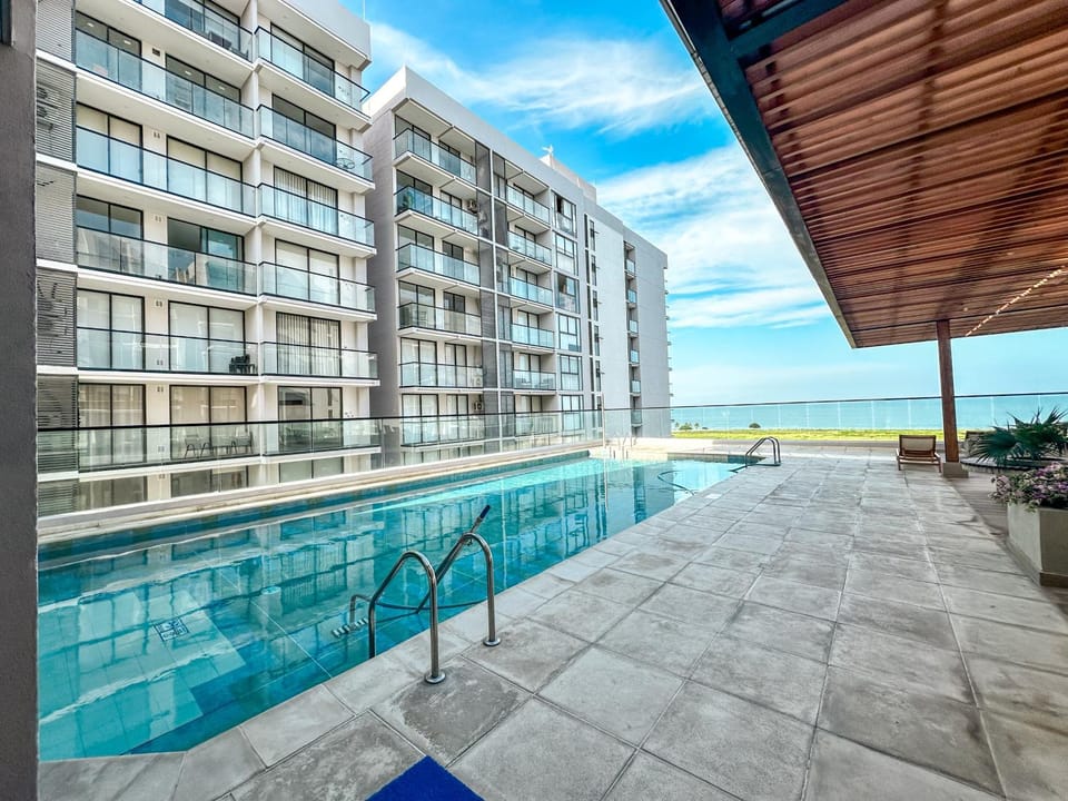 Property building, Day, Natural landscape, Pool view, Swimming pool, sunbed