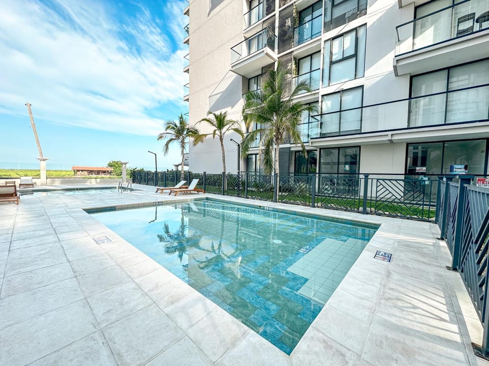 Property building, Day, Swimming pool, sunbed