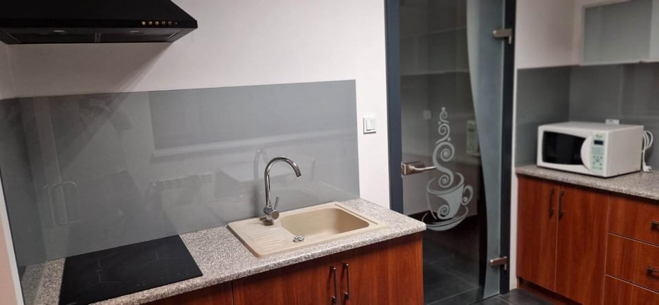 Kitchen or kitchenette, stove