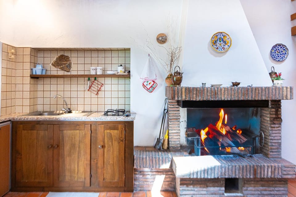Living room, Seating area, fireplace, kitchen