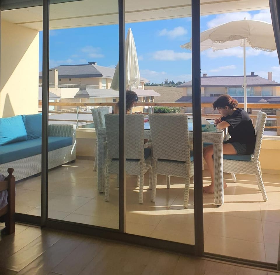 Patio, View (from property/room), Balcony/Terrace, Living room, Seating area, Dining area, Pool view, Sea view