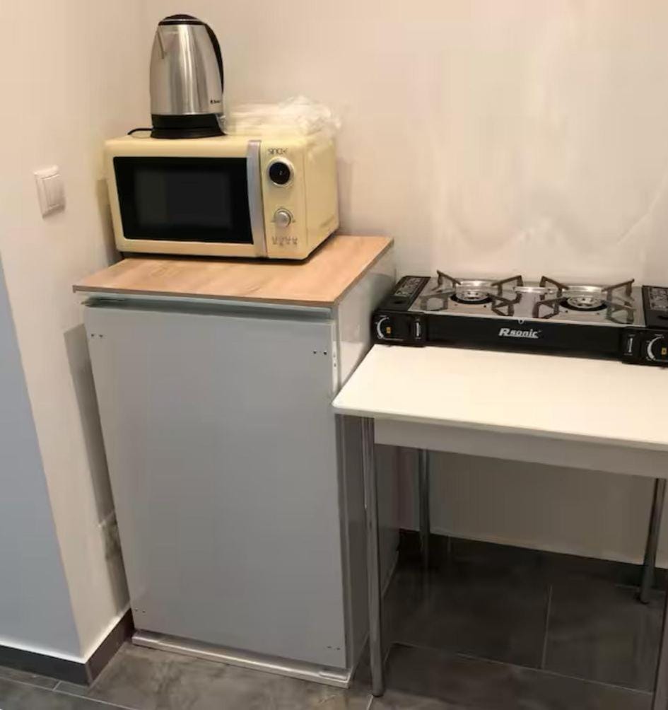 Kitchen or kitchenette, oven, stove