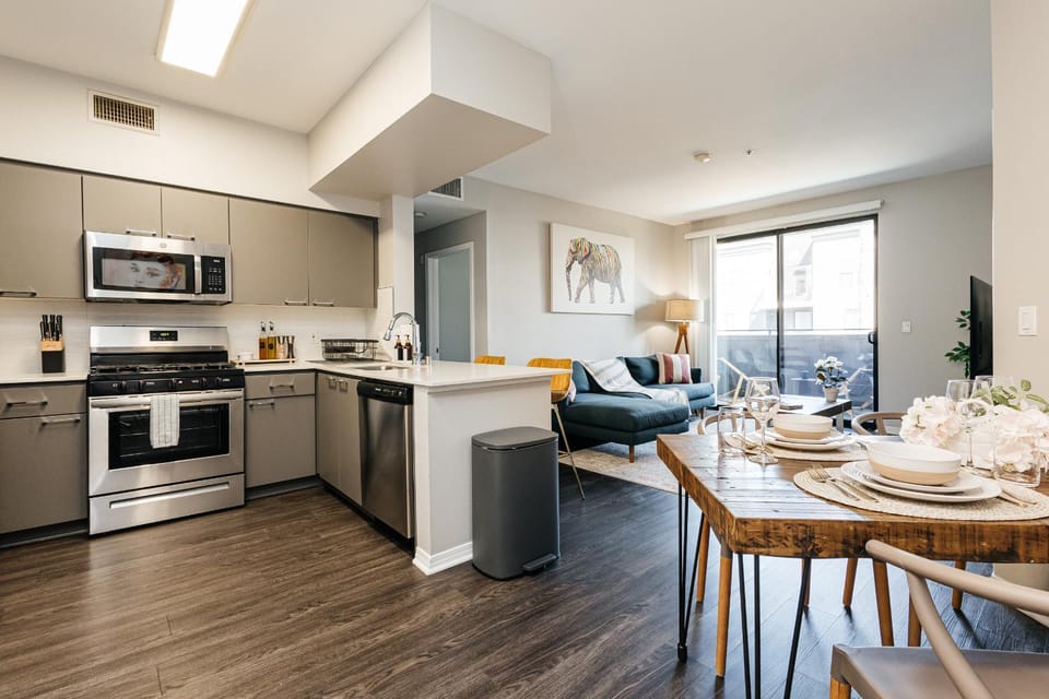 Kitchen or kitchenette, Living room, Seating area, Dining area, dishwasher, oven, stove, toaster
