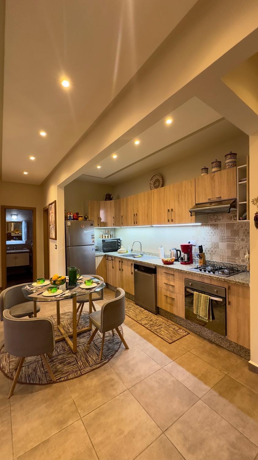 Kitchen or kitchenette, dishwasher, oven, stove, toaster