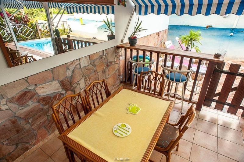 Patio, Dining area, Pool view