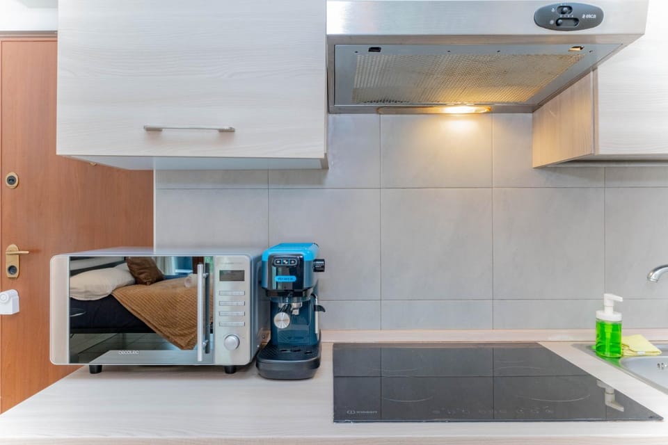 Kitchen or kitchenette, oven, stove
