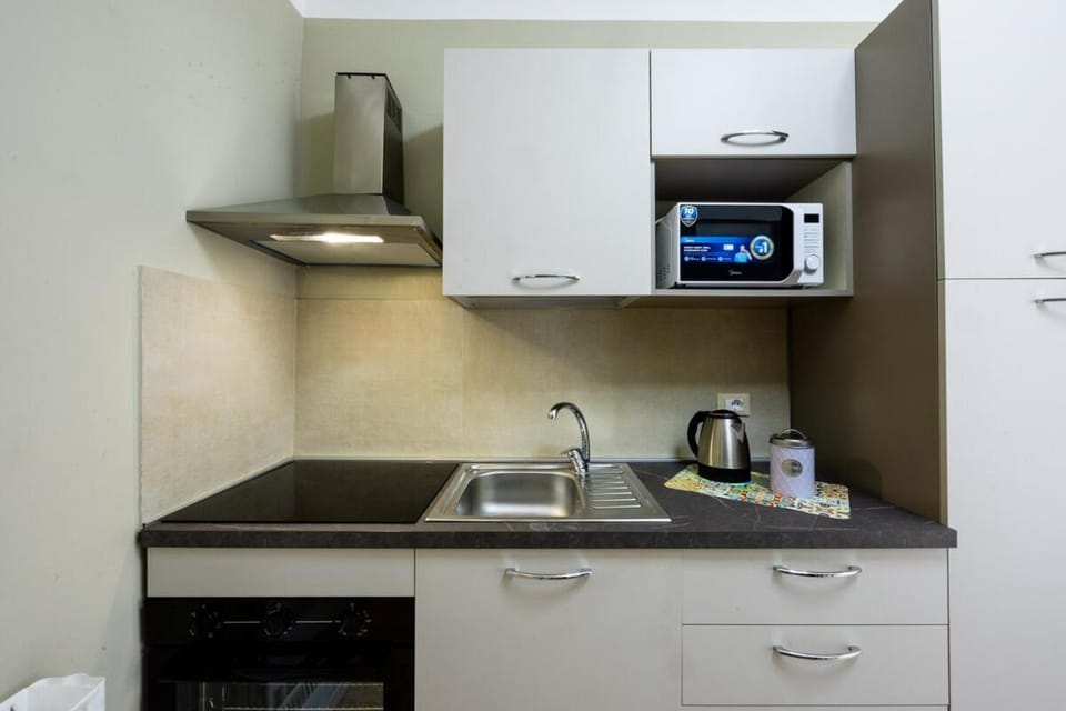 Kitchen or kitchenette, stove