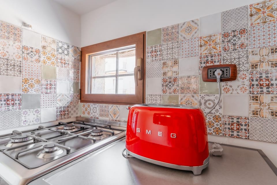Kitchen or kitchenette, toaster