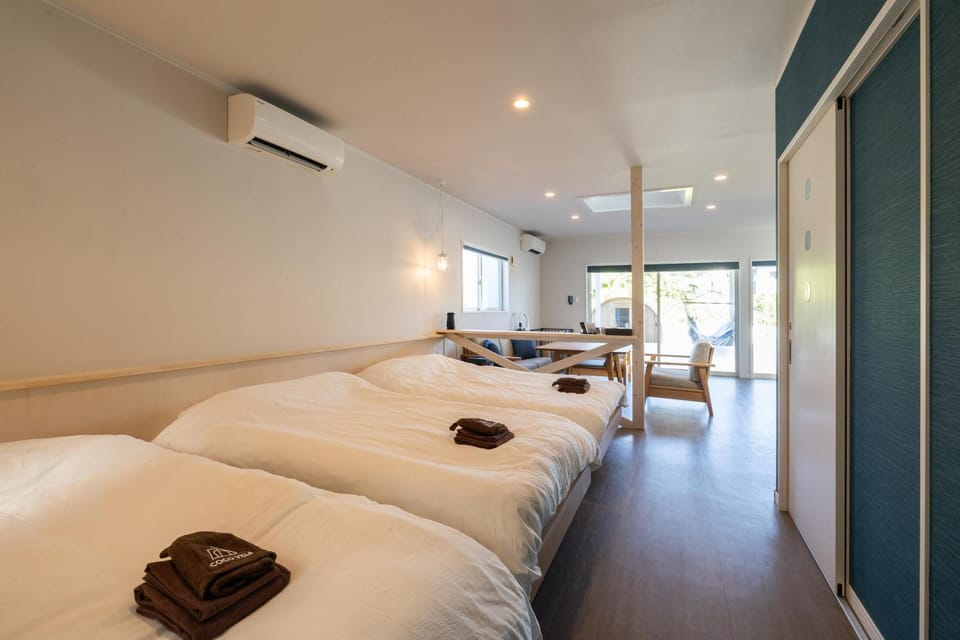 Bed, Photo of the whole room, Bedroom, towels, air conditioner