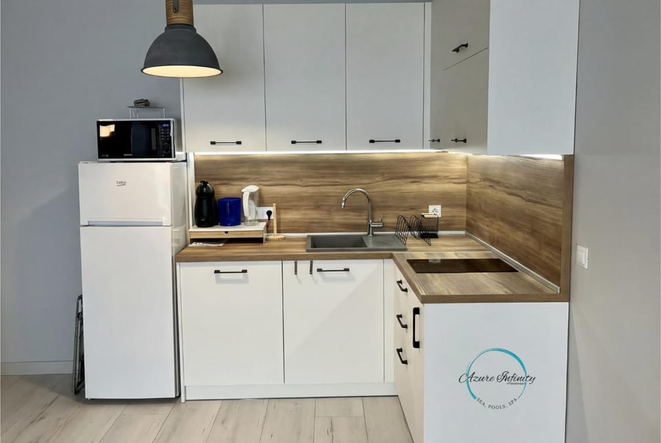 Coffee/tea facilities, Kitchen or kitchenette, microwave, stove, washing machine, dryer