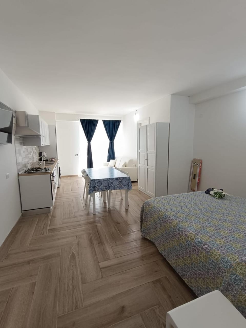 Bed, Living room, Seating area, wardrobe