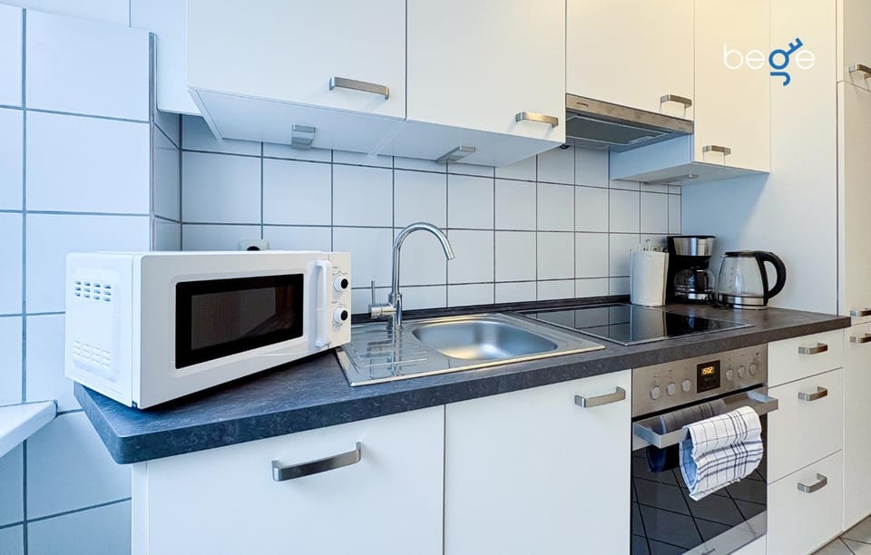 Kitchen or kitchenette, stove, toaster