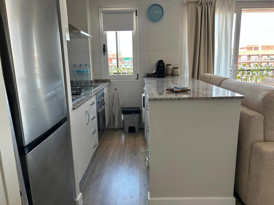 Kitchen or kitchenette, oven, stove