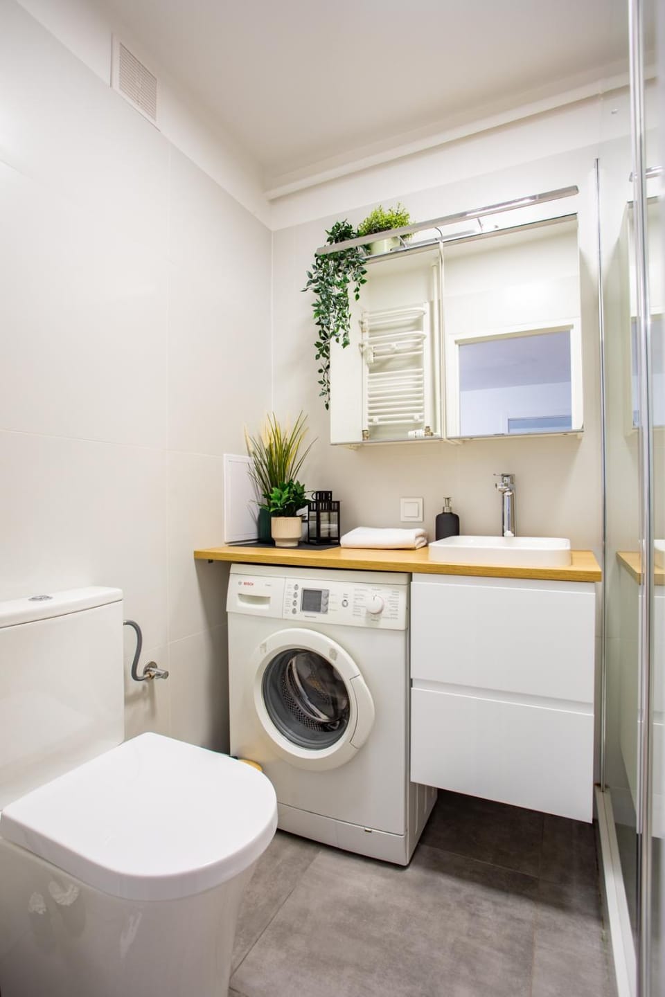 Shower, Toilet, Bathroom, towels, washing machine, dryer