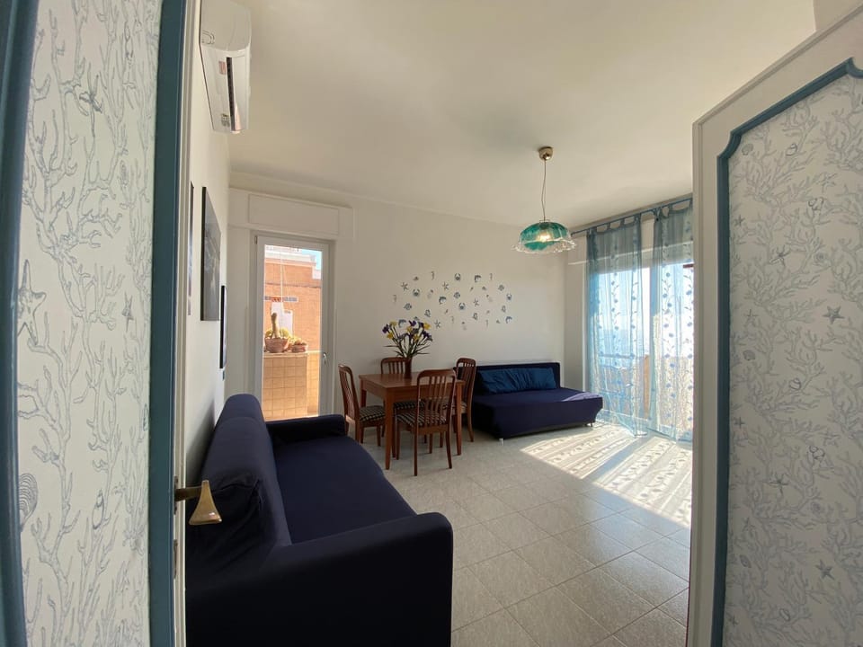Bed, Living room, Seating area