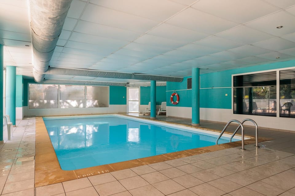 Property building, Living room, Swimming pool