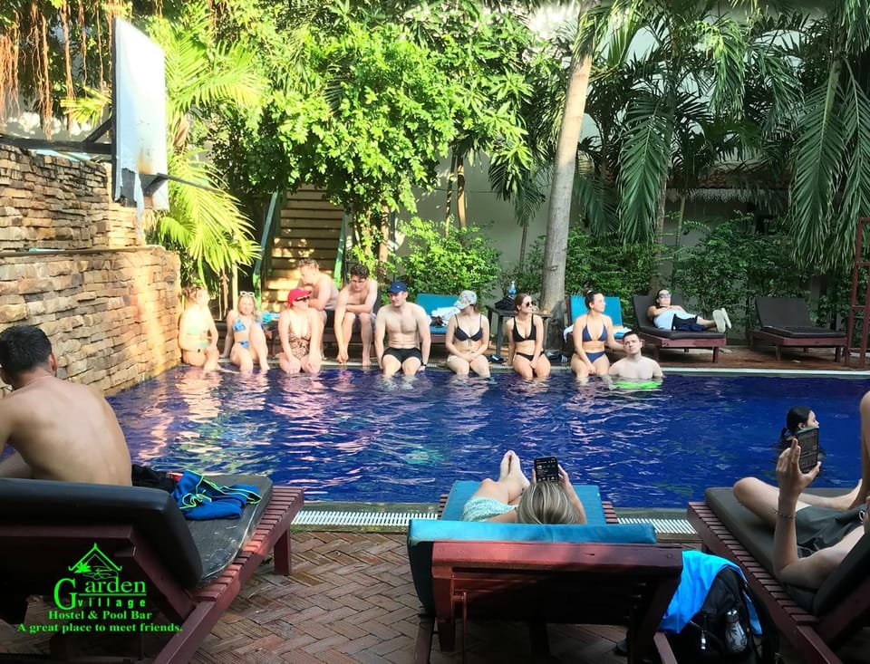 People, Natural landscape, Garden, Garden view, Pool view, Swimming pool, Swimming pool, group of guests, sunbed