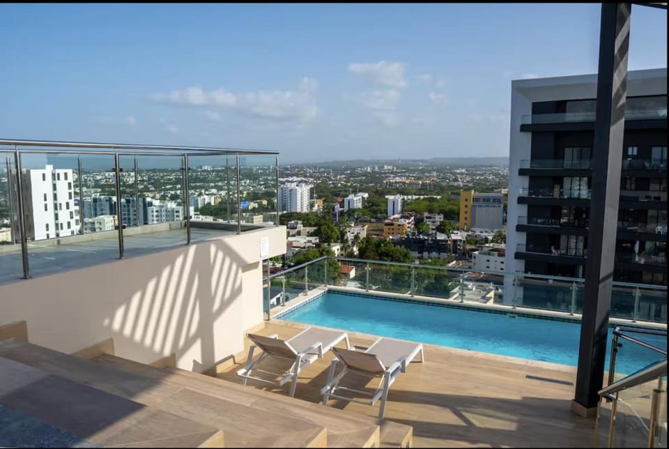 Property building, View (from property/room), Balcony/Terrace, City view, Swimming pool, sunbed